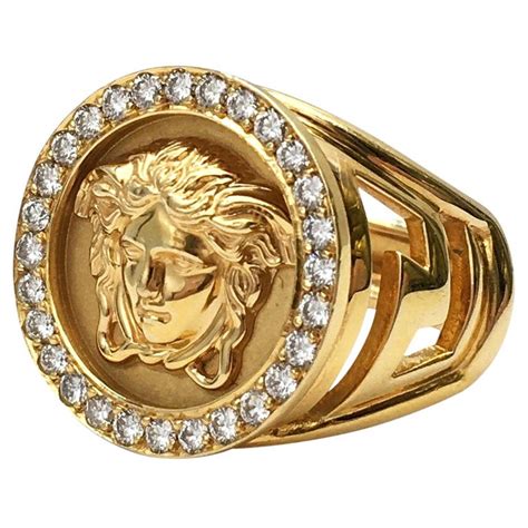 versace gold and black ring|Versace 18k gold ring.